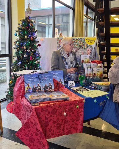 Sr Rita Kelly, MMM at the book table